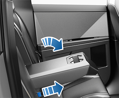 Кнопка на спинке заднего центрального сиденья