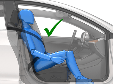 человек сидит, поставив ноги на пол, с зеленой галочкой