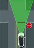 Vehicle approaching a four way intersection and stops at the stop sign