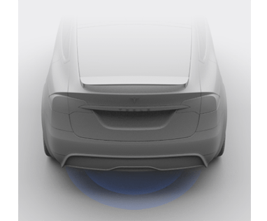 Задняя часть автомобиля с расходящимися синими линиями