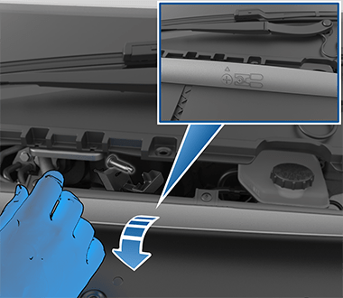 Изображение, на котором рука в перчатке отгибает уплотнитель HEPA-фильтра.